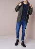 Rains Regenjas met klepzakken en capuchon online kopen